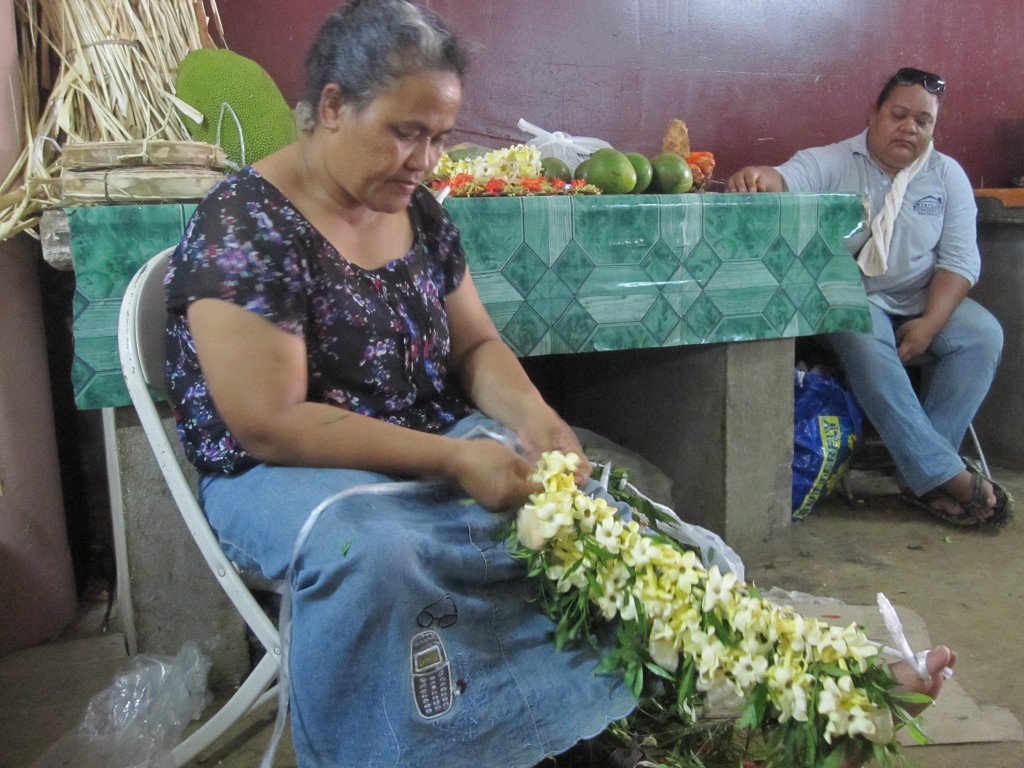 Woman Braiding Garland at Meketi Talamahu