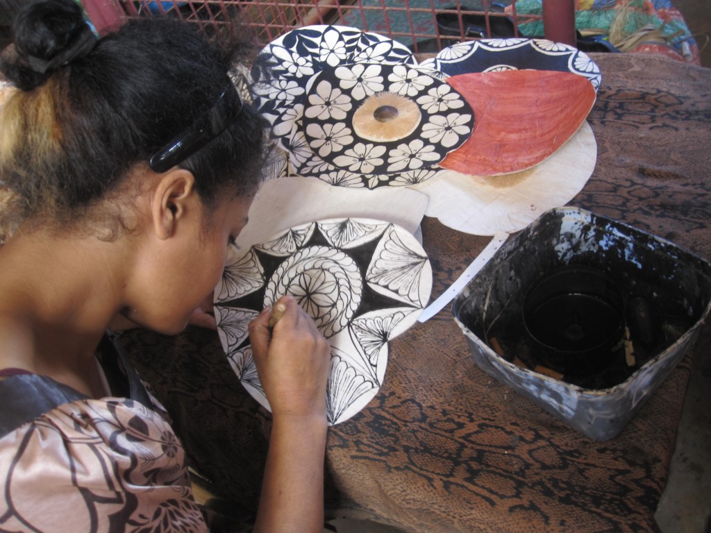 Girl painting Tapa Fans