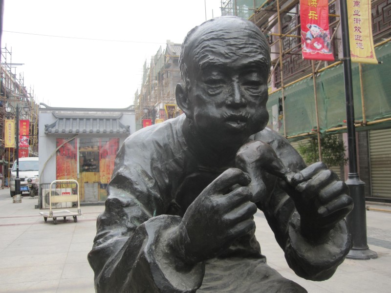 Bronze statue at Ancient Cultural Street in Tianjin, China