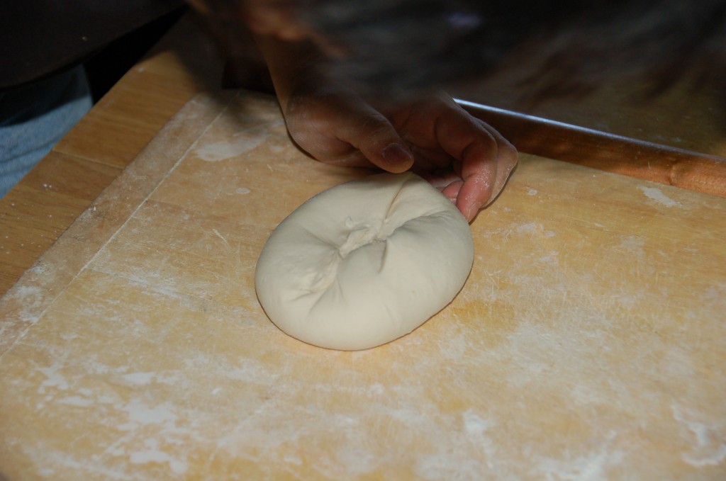 Kneading smaller portion of dough.Chinese Dumplings.Jiaozi