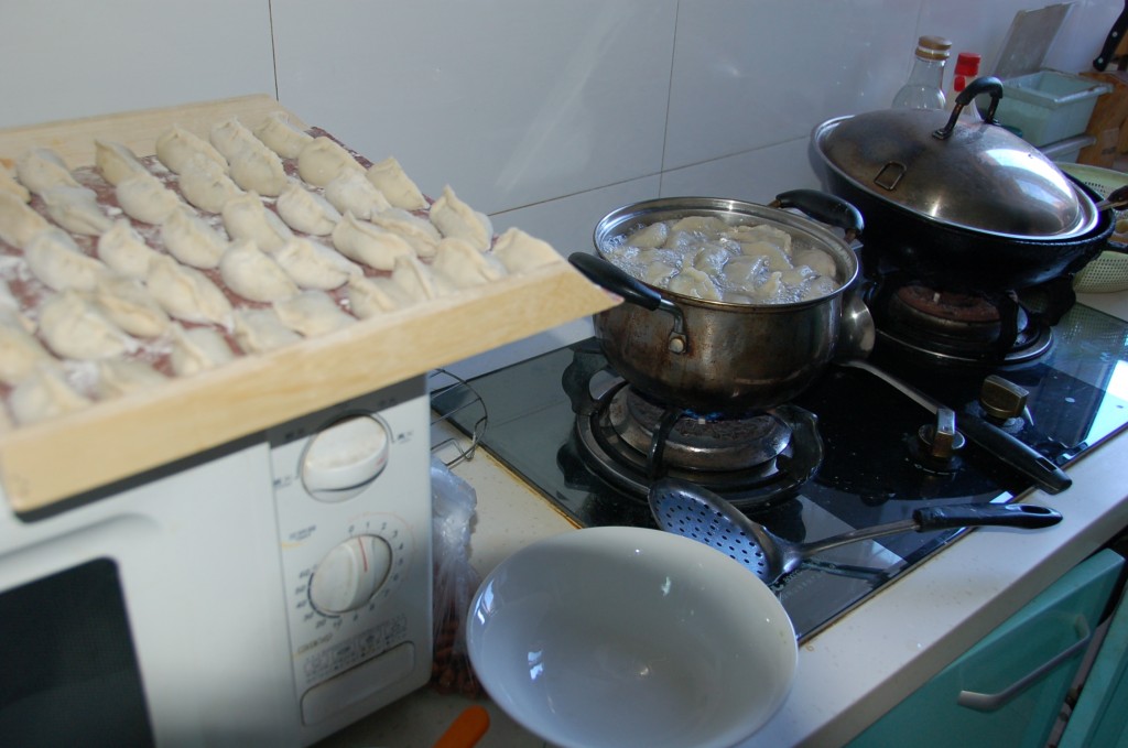 Boiling Chinese Dumplings.How to make Chinese Dumplings.Jiaozi