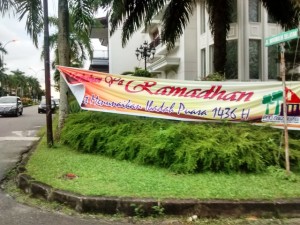 Ramadan in Balikpapan: Banners like this, and giant posters showing political leaders in their best Muslim attire are found all over town.