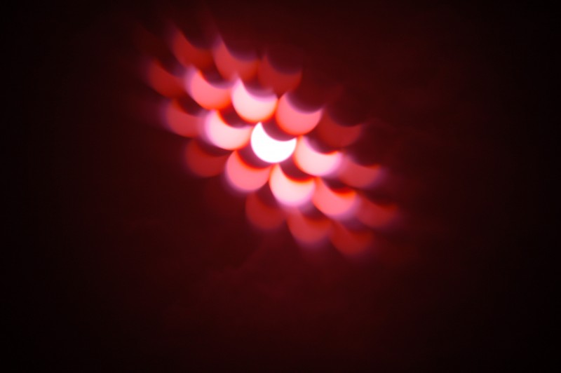 Early Moments of Total Solar Eclipse Filmed Through 2 Layer DIY Solar Camera Filter made with XRAY Film With Layers Rotated Relative to One Another Demonstrating Birefringence